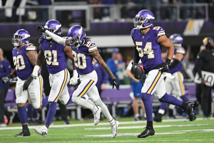 Nov 27, 2023; Minneapolis, Minnesota, USA; Minnesota Vikings linebacker Anthony Barr (54) reacts with safety Jay Ward (20) and linebacker Pat Jones II (91) after a fumble recovery by Barr during the fourth quarter against the Chicago Bears at U.S. Bank Stadium.